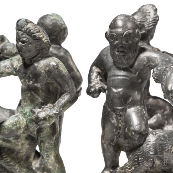 Two Roman bronze yoke fittings with satyr, silen and goats, late 1st - mid-3rd century A.D.