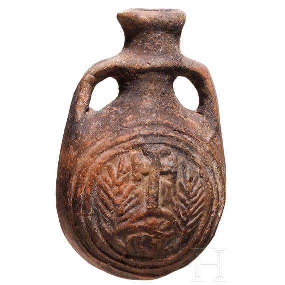 An early Byzantine pilgrim's bottle, mould-shaped ceramic, 6th - 7th century