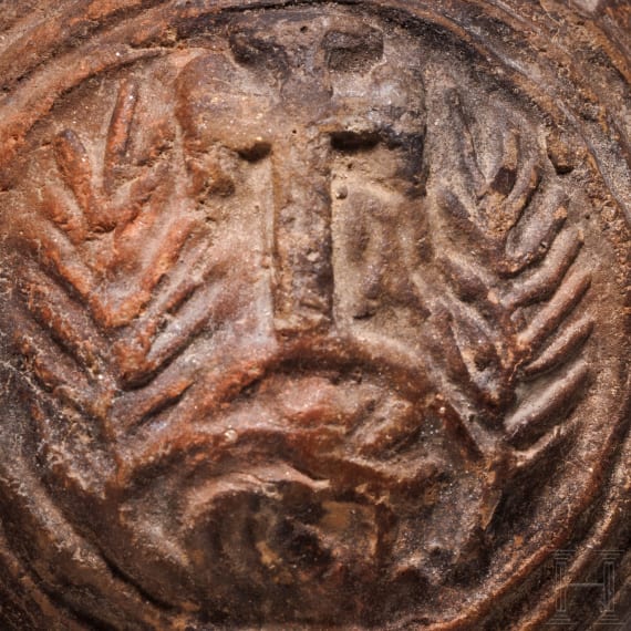An early Byzantine pilgrim's bottle, mould-shaped ceramic, 6th - 7th century