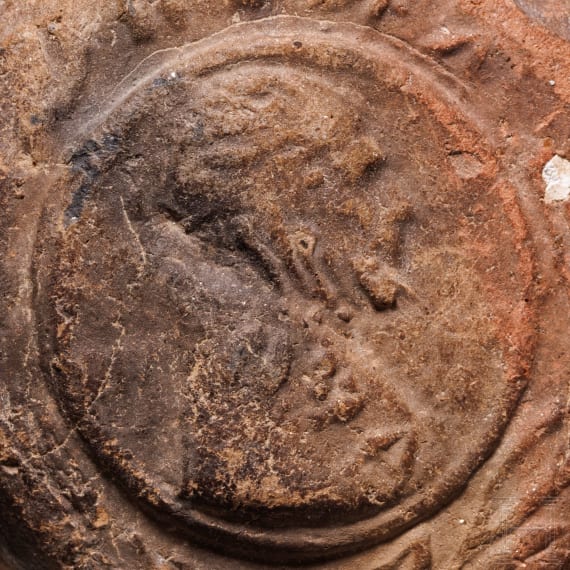 An early Byzantine pilgrim's bottle, mould-shaped ceramic, 6th - 7th century