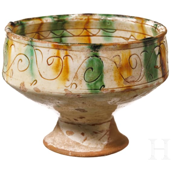 A late Byzantine bowl with coloured glaze and ring stand, 12th - 14th century A.D.