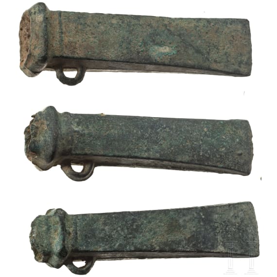 Three Breton bronze axes type Dahouet, late Bronze Age to early Iron Age of western Europe, 10th - 5th century B.C.