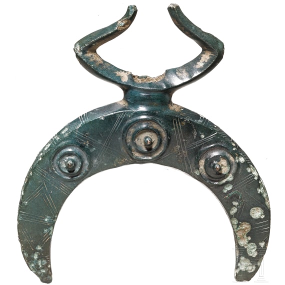 A solid lunula-shaped fitting with stylized water birds, late Bronze Age, 10th - 9th century B.C.