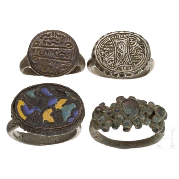 Two silver and two bronze rings, Balkan, 15th - 16th century