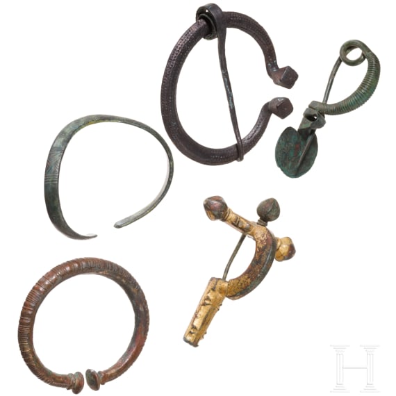 Three brooches and two rings from the Hallstatt period, 7th century B.C. - 11th century A.D.