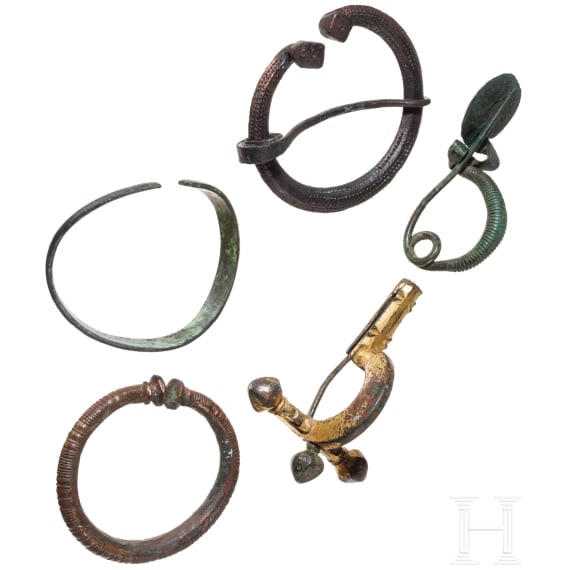 Three brooches and two rings from the Hallstatt period, 7th century B.C. - 11th century A.D.