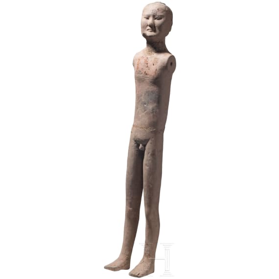 A Chinese painted clay figure of a standing nude man, Han Dynasty, circa 150 B.C.