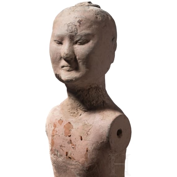 A Chinese painted clay figure of a standing nude man, Han Dynasty, circa 150 B.C.