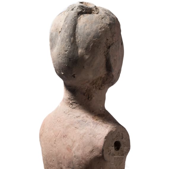 A Chinese painted clay figure of a standing nude man, Han Dynasty, circa 150 B.C.