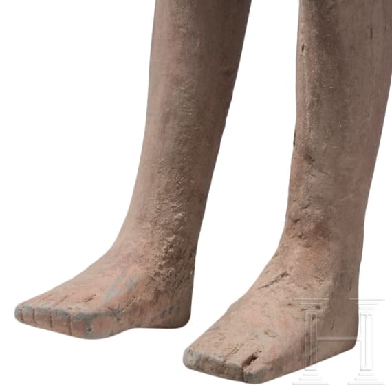 A Chinese painted clay figure of a standing nude man, Han Dynasty, circa 150 B.C.