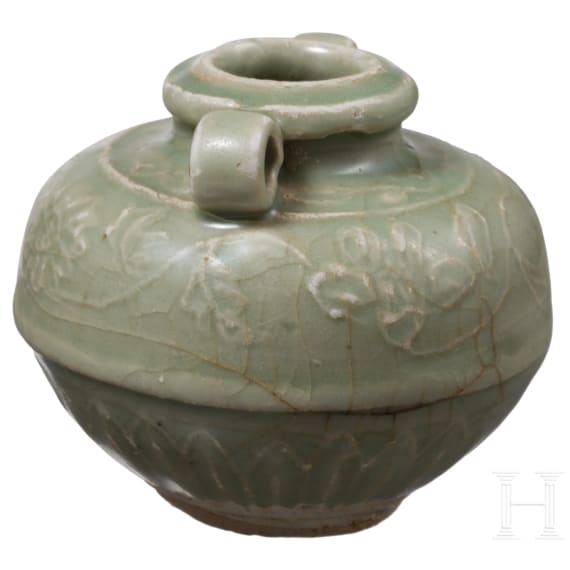 A small Chinese molded Longquan celadon vase, probably Ming Dynasty