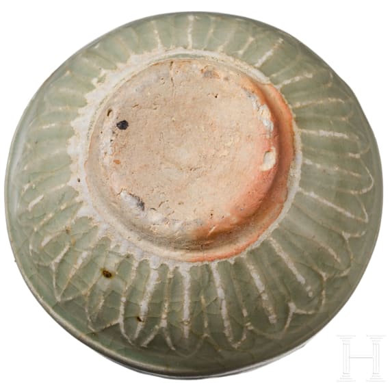 A small Chinese molded Longquan celadon vase, probably Ming Dynasty