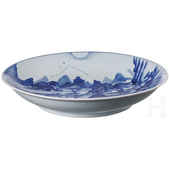 A Chinese blue and white porcelain charger with river and mountain scene, probably 19th/20th century
