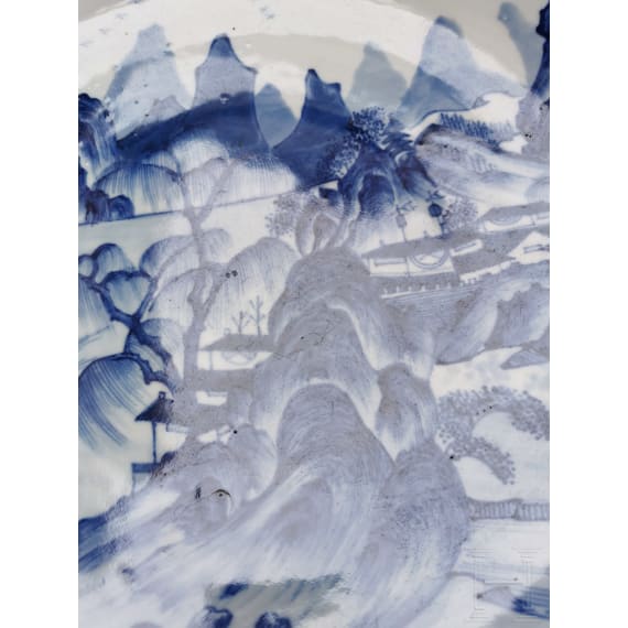 A Chinese blue and white porcelain charger with river and mountain scene, probably 19th/20th century