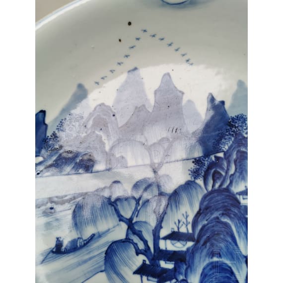 A Chinese blue and white porcelain charger with river and mountain scene, probably 19th/20th century