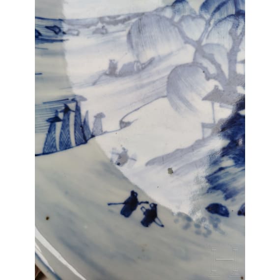 A Chinese blue and white porcelain charger with river and mountain scene, probably 19th/20th century