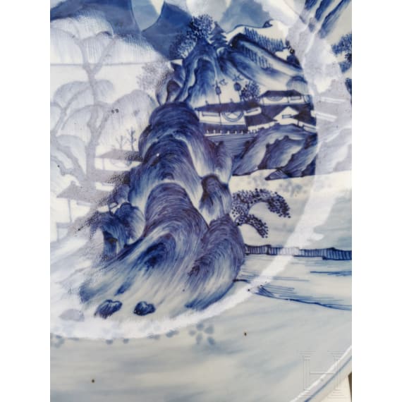 A Chinese blue and white porcelain charger with river and mountain scene, probably 19th/20th century