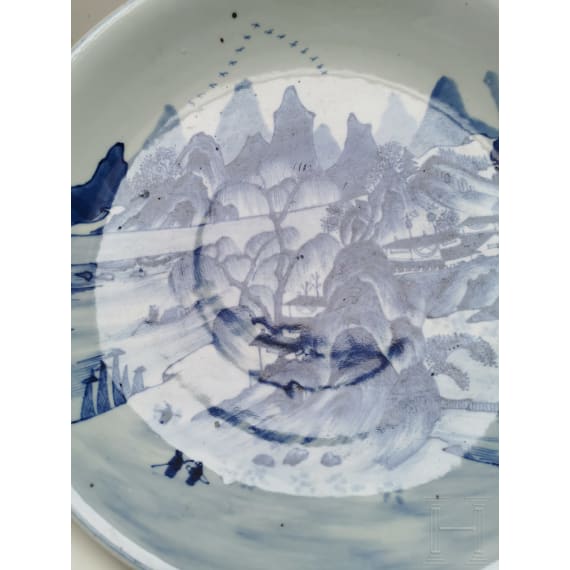 A Chinese blue and white porcelain charger with river and mountain scene, probably 19th/20th century