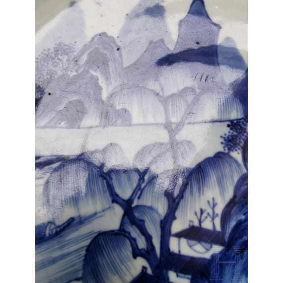 A Chinese blue and white porcelain charger with river and mountain scene, probably 19th/20th century