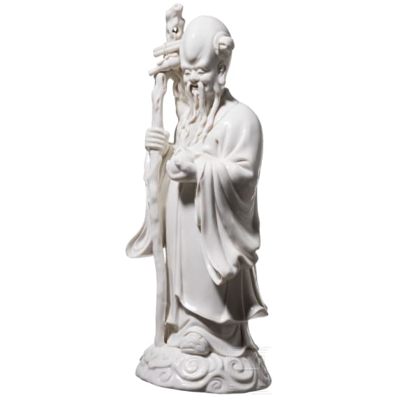 A Chinese blanc-de-chine porcelain figure of Shoulao, 20th century