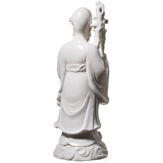 A Chinese blanc-de-chine porcelain figure of Shoulao, 20th century