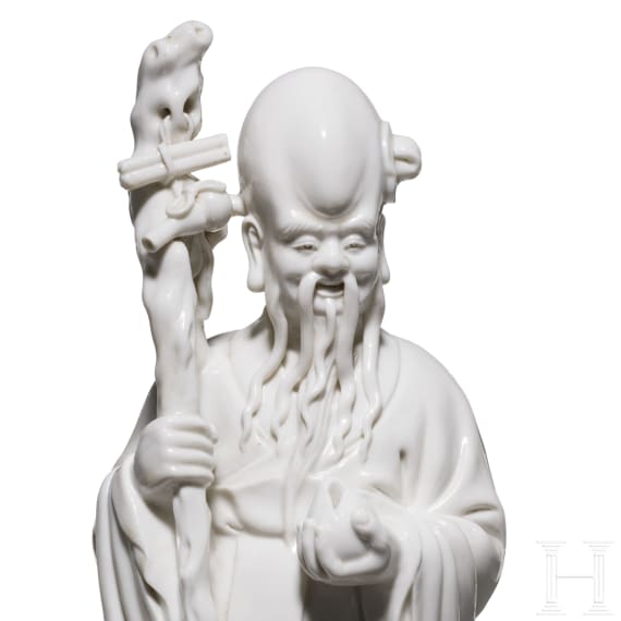 A Chinese blanc-de-chine porcelain figure of Shoulao, 20th century