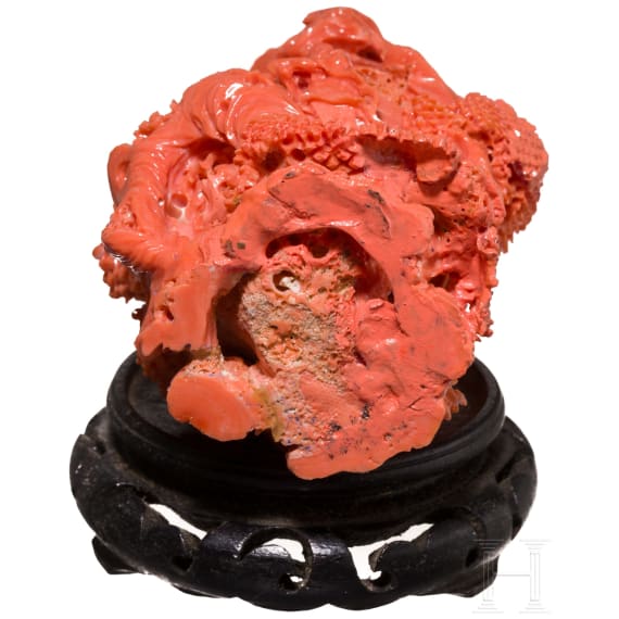 A carved Chinese figural coral flask, 20th century