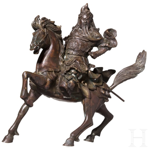 A Chinese bronze figure of a mounted warrior, circa 1900