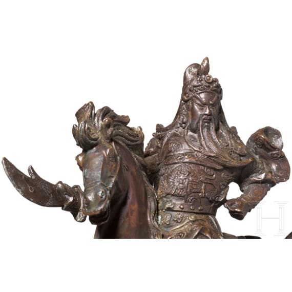 A Chinese bronze figure of a mounted warrior, circa 1900