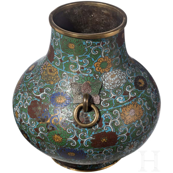 A large Chinese lotus patterned cloisonn&eacute; jar with wooden stand, 20th century