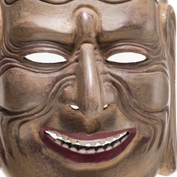 A Japanese Gigaku Noh Drama mask of a laughing old man, Edo period, 19th century
