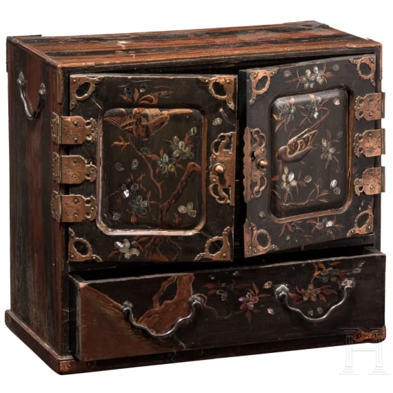 A Japanese cabinet with lacquer painting and a round jar, circa 1900