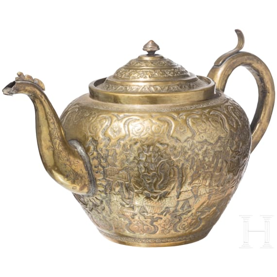 An embossed Persian copper tea pot (jug), Qajar period, circa 1800