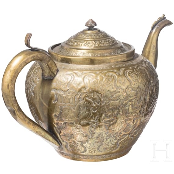 An embossed Persian copper tea pot (jug), Qajar period, circa 1800