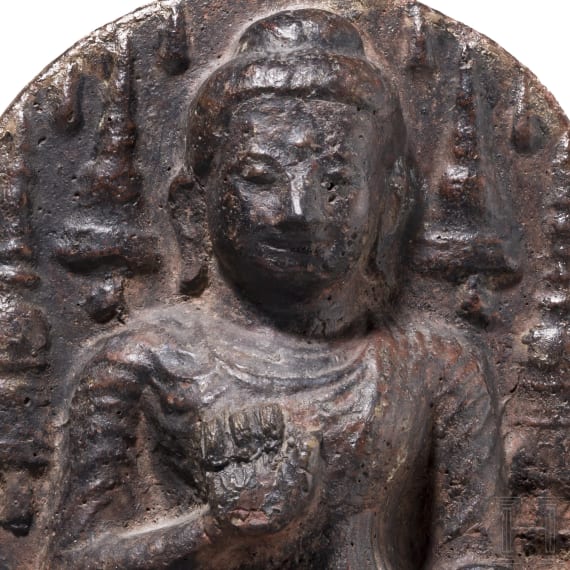 An Indian terracotta figure of a seated Buddha, probably 18th century