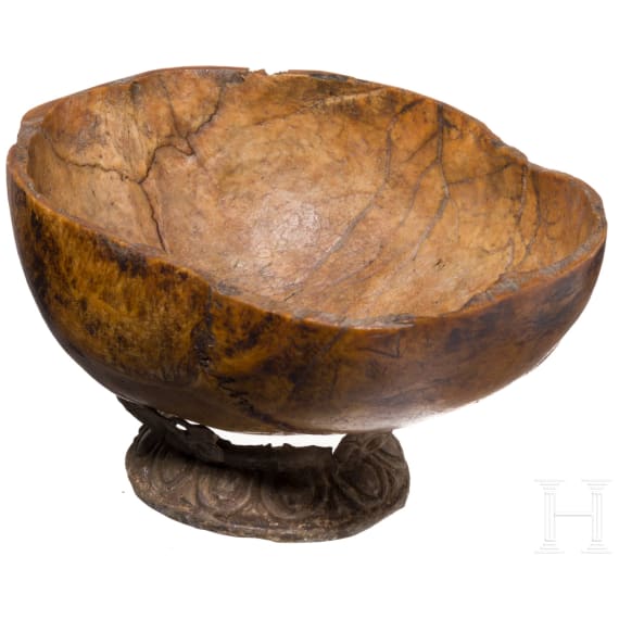 A Tibetan kapala skull bowl on metal stand, 19th century