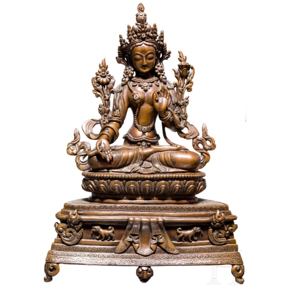 A Nepalese crystal-set bronze figurine of the Green Tara, circa 1900