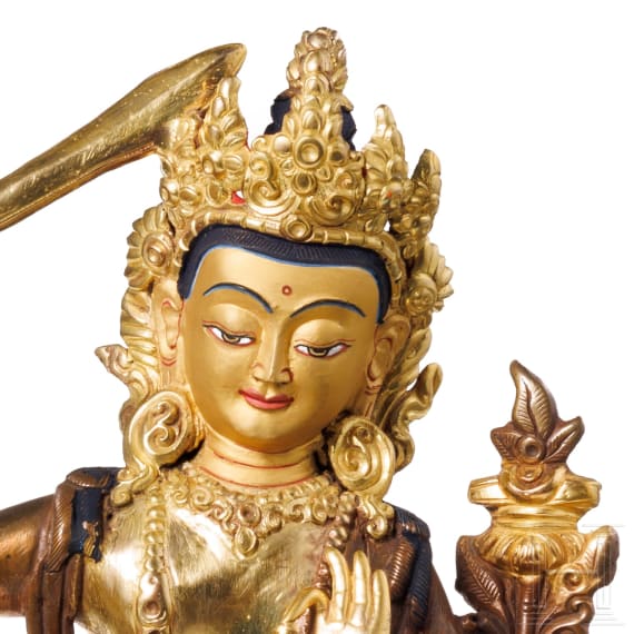 Two Nepalese bronze figures, Naga Kanya and Manjushri, 20th century
