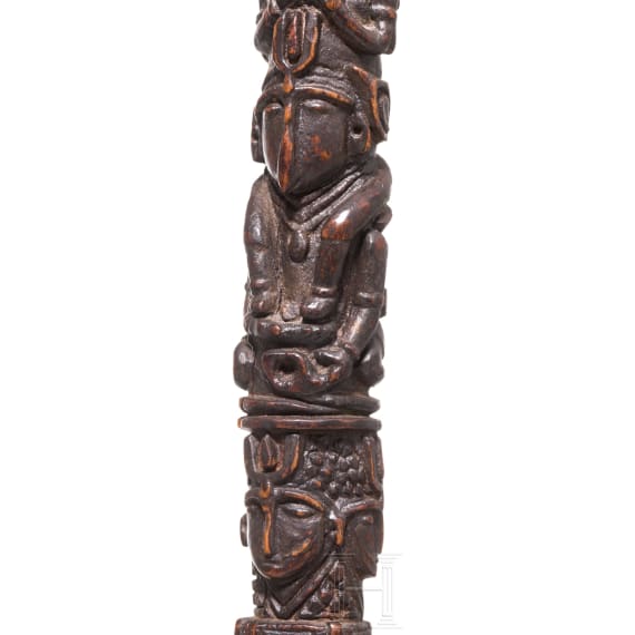 An Indonesian lime powder container (tagan) and tunggal panaluan fragment, 20th century