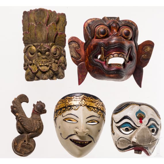 Four mainly Javanese masks and an Indonesian carved wooden chicken, 20th century