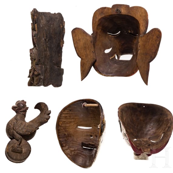 Four mainly Javanese masks and an Indonesian carved wooden chicken, 20th century