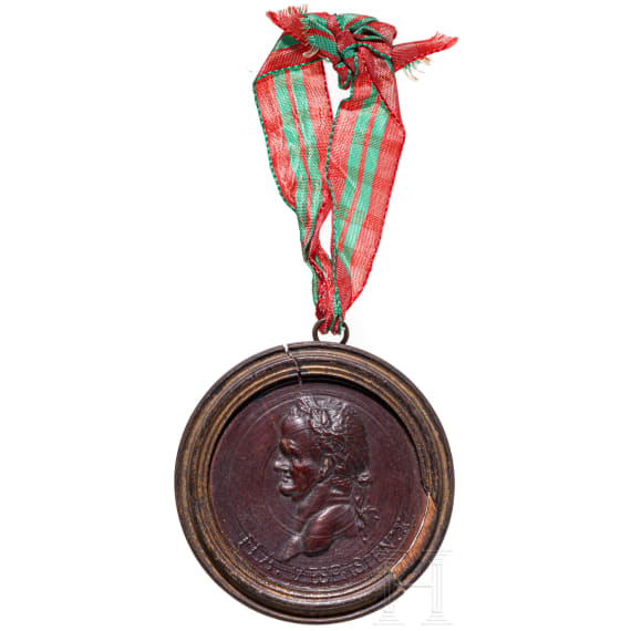 A French turned wood relief with profile of Emperor Vespasian, 18th century