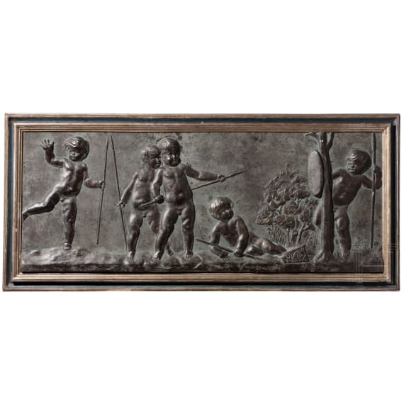 A German stucco relief panel with playing putti, circa 1900