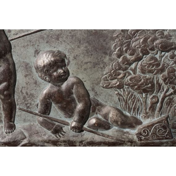A German stucco relief panel with playing putti, circa 1900