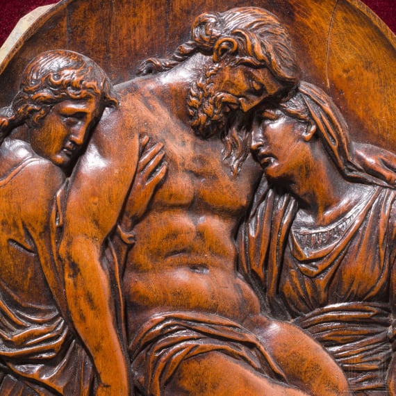 A French carved boxwood panel showing the Lamentation of Christ, late 16th century