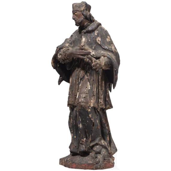 A German or Bohemian wooden figurine of St. Nepomuk, 18th century