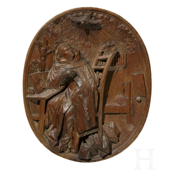A carved Franconian oak panel showing St. Francis, 18th century