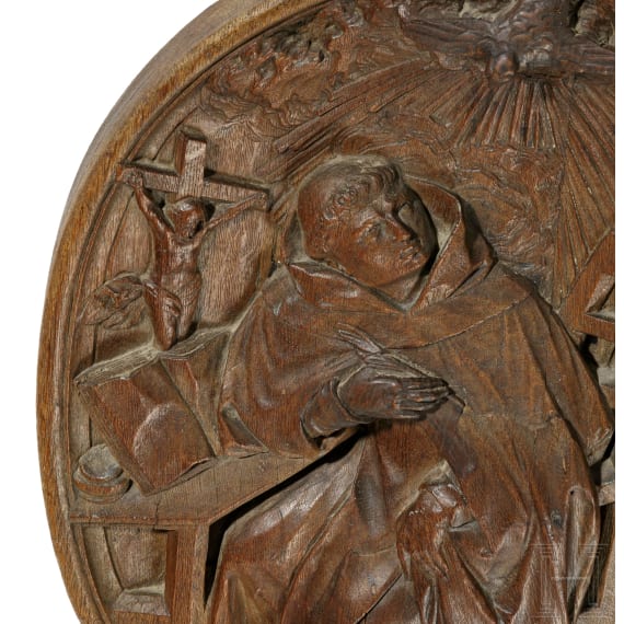 A carved Franconian oak panel showing St. Francis, 18th century