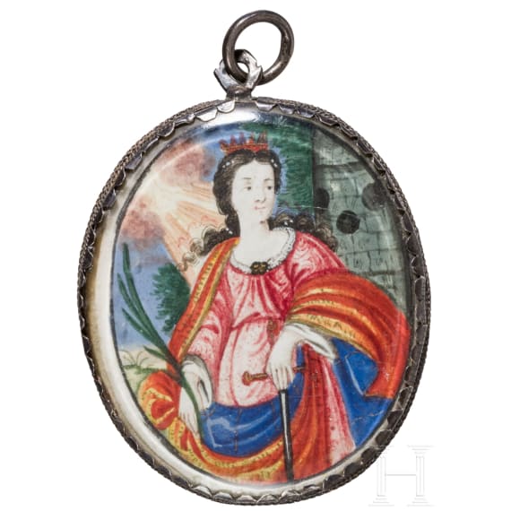 A silver mounted reliquary showing Saint Catherine of Alexandria, circa 1700