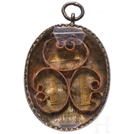 An Austrian or Italian silver-mounted reliquary pendant, circa 1800
